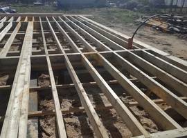 КД35. Полутораэтажный каркасный дом 8х8 с террасой и эркером. Фото