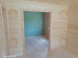 КД35. Полутораэтажный каркасный дом 8х8 с террасой и эркером. Фото
