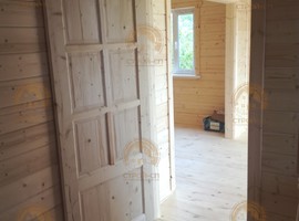 КД35. Полутораэтажный каркасный дом 8х8 с террасой и эркером. Фото