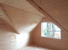 КД35. Полутораэтажный каркасный дом 8х8 с террасой и эркером. Фото