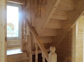 КД35. Полутораэтажный каркасный дом 8х8 с террасой и эркером. Фото