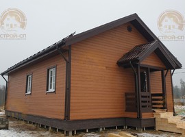 Проект одноэтажного каркасного дома КО16 10х8 для дачи и ПМЖ с террасой и кухней-гостиной 10 на 8. три спальни Фото