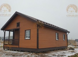 Проект одноэтажного каркасного дома КО16 10х8 для дачи и ПМЖ с террасой и кухней-гостиной 10 на 8. три спальни Фото