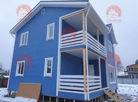 Проект двухэтажного каркасного дома ПАРНАС 9х8 для дачи и ПМЖ с террасой и кухней-гостиной 9 на 8. Фото